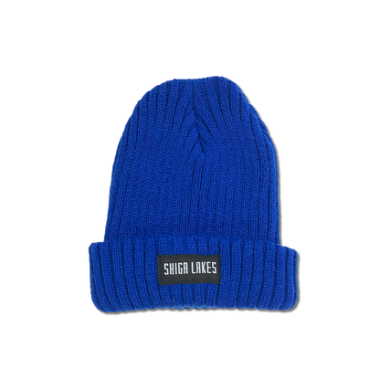 Knit cap with tag